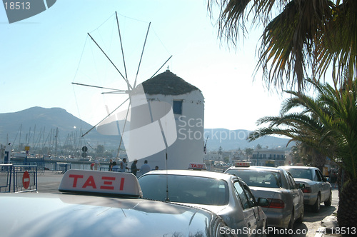 Image of windmill and taxis