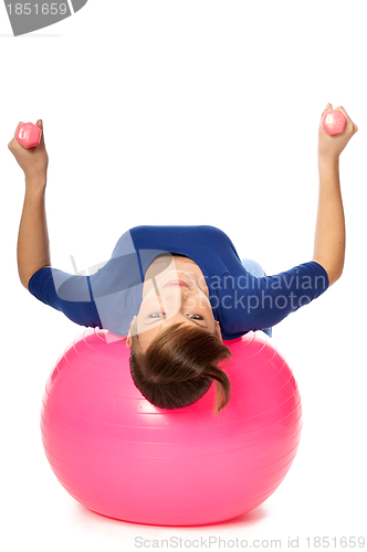 Image of Exercises with dumbbells on a gymnastic ball