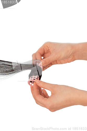 Image of hairdresser makes curls