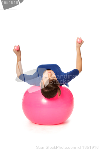 Image of Exercises with dumbbells on a gymnastic ball