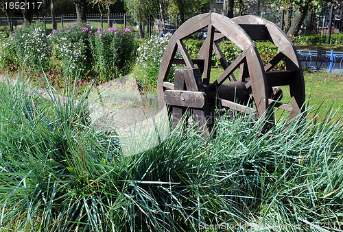 Image of Wooden Wheel in the Park