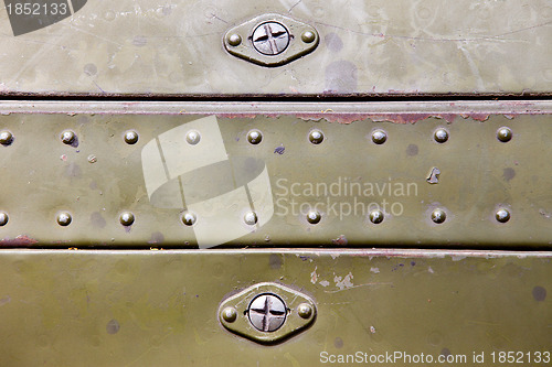 Image of metal surface with rivets