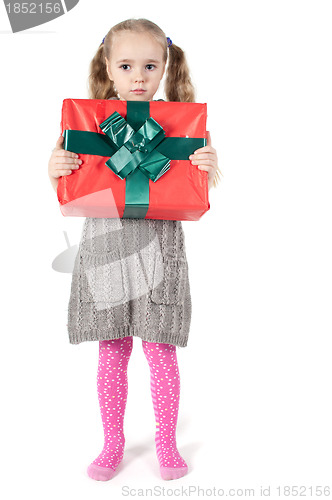 Image of Beautiful girl with christmas present