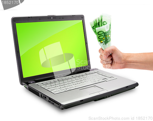 Image of Laptop and money