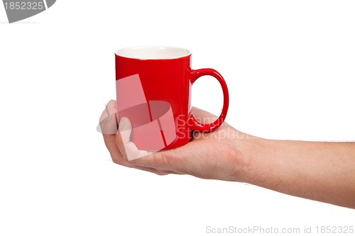 Image of Male hand is holding a red cup