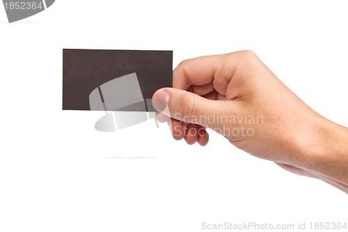 Image of Businessman's hand holding blank business card