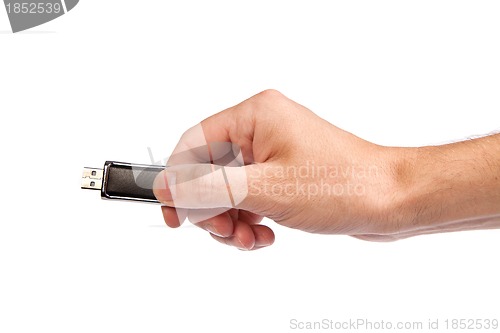 Image of Closeup image: hand holding black USB data storage or connecting
