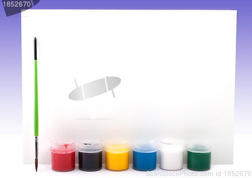 Image of Paints with paintbrush