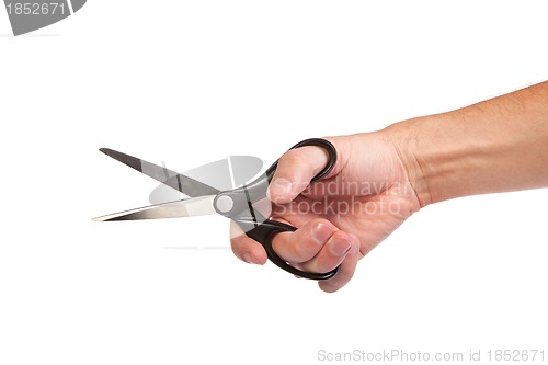 Image of Hand is holding scissors isolated