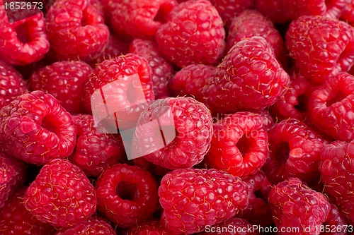 Image of Ripe rasberry fruit horizontal close up background.