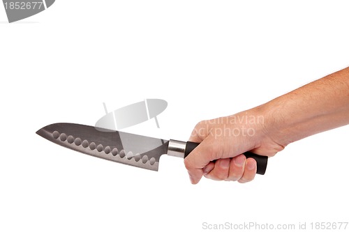 Image of Hand is holding a kitchen kinfe isolated