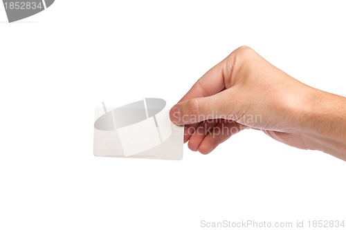 Image of Businessman's hand holding blank business card