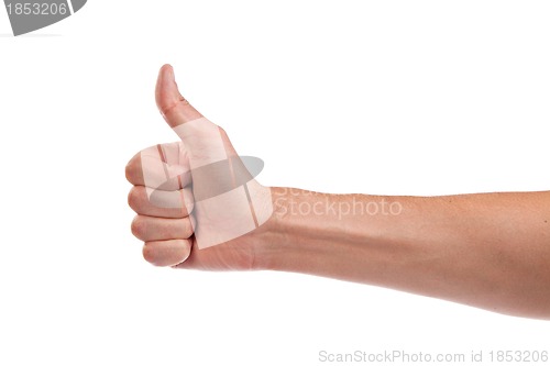 Image of Male hand showing thumbs up sign isolated on white