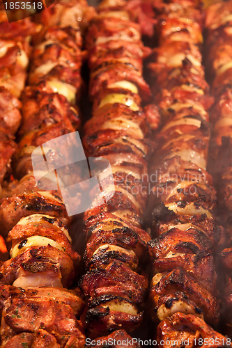 Image of Steak and other meat on barbeque. Background