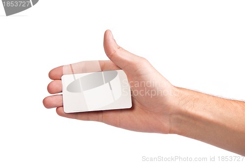 Image of Businessman's hand holding blank business card