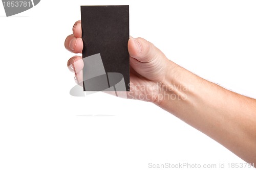 Image of Businessman's hand holding blank business card