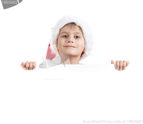 Image of Boy holding a christmas poster 