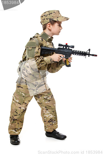 Image of Young soldier with rifle