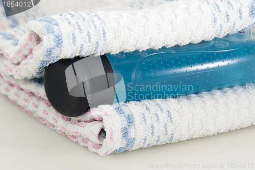 Image of Towel and shower gel 