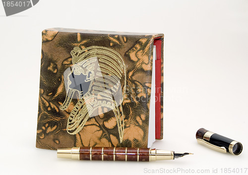 Image of Notebook and pen