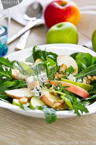 Image of Apple with Blue cheese ,walnut and rocket salad