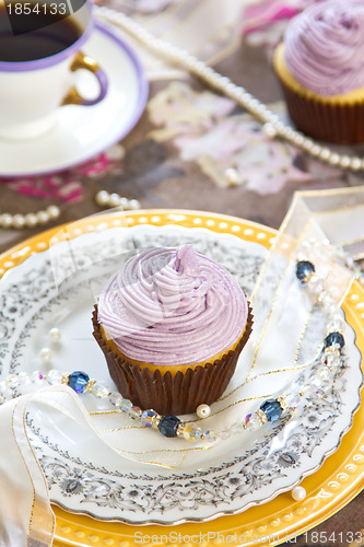 Image of Cupcake with violet cream