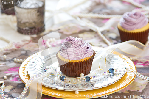 Image of Cupcake with violet cream