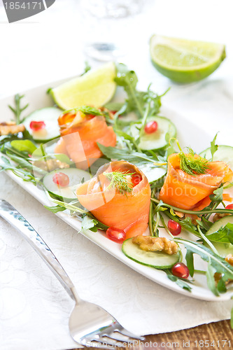 Image of Smoked salmon with pomegranate and rocket salad