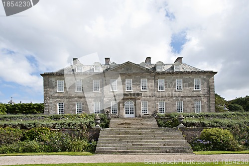 Image of English Country House and Flowerbeds