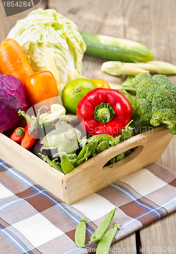 Image of Varieties of vegetables in wood tray