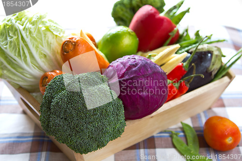 Image of Varieties of vegetables in wood tray