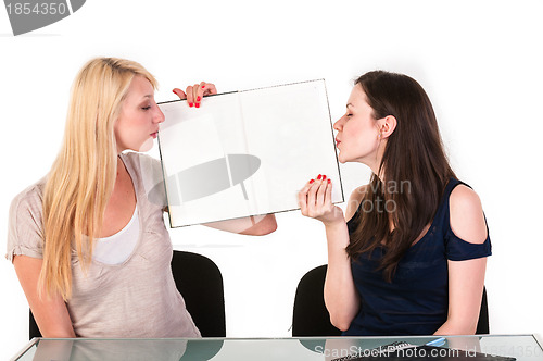 Image of Two beautiful student girls getting ready for school