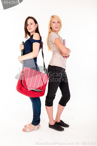 Image of Two beautiful student girls getting ready for school