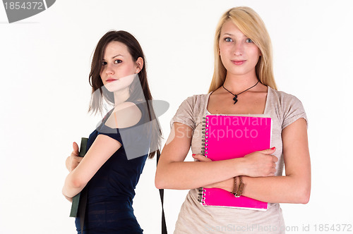 Image of Two beautiful student girls getting ready for school