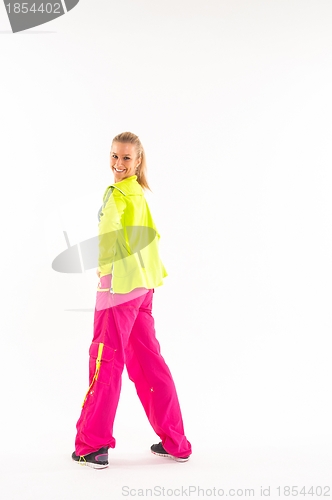 Image of Young woman in sport outfit