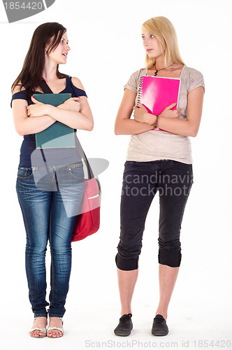 Image of Two beautiful student girls getting ready for school