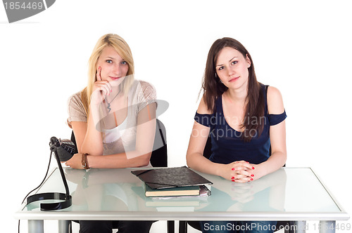 Image of Two beautiful student girls getting ready for school