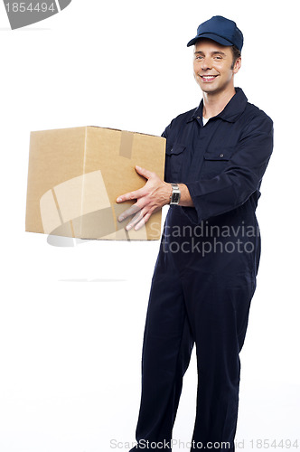 Image of Worker unloading and loading carton