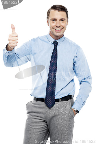 Image of Picture of a male executive showing thumbs up