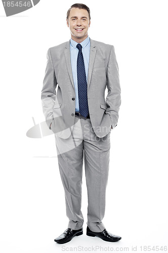 Image of Casual full length portrait of professional businessman
