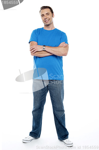 Image of Full length picture of a young casual man