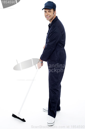 Image of Professional cleaner wiping the floor