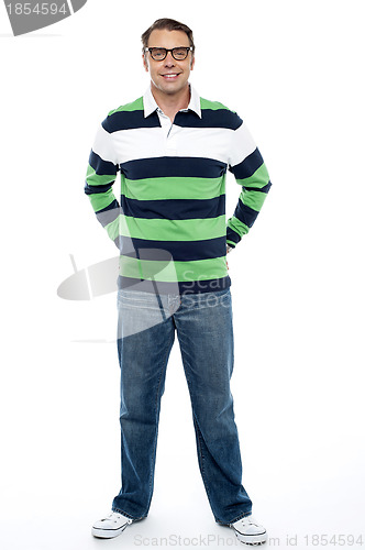 Image of Full length shot of handsome casual male model