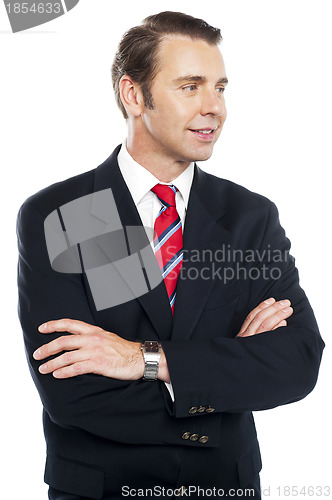 Image of Handsome male consultant looking away