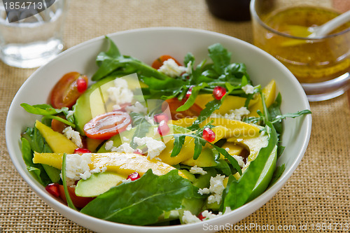 Image of Avocado with Mango,Pomegranate and Feta salad