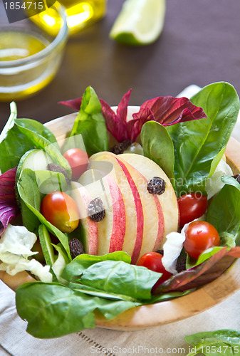 Image of Apple with raisin and spinach salad