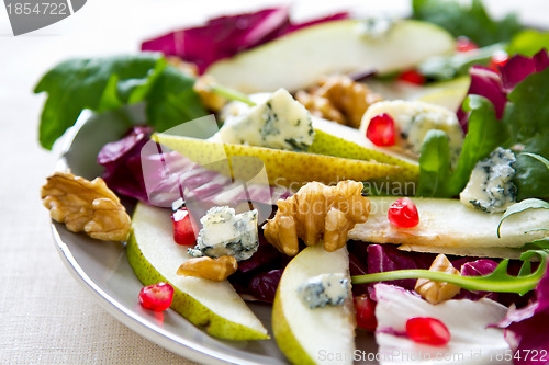 Image of Pear with Blue cheese and pomegranate salad