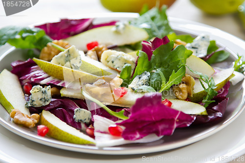 Image of Pear with Blue cheese and pomegranate salad