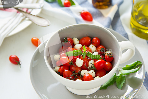Image of Cherry tomato with pearl mozzarella salad