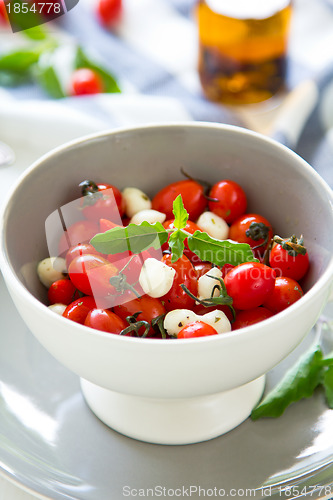 Image of Cherry tomato with pearl mozzarella salad